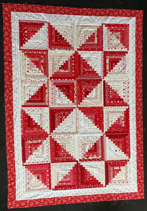 Micki W.'s Finished GO! Scrappy Star Log Cabin Quilt