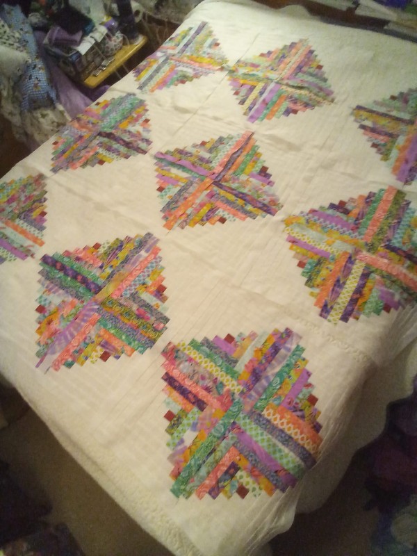 Sonya J.'s Finished GO! Scrappy Star Log Cabin Quilt